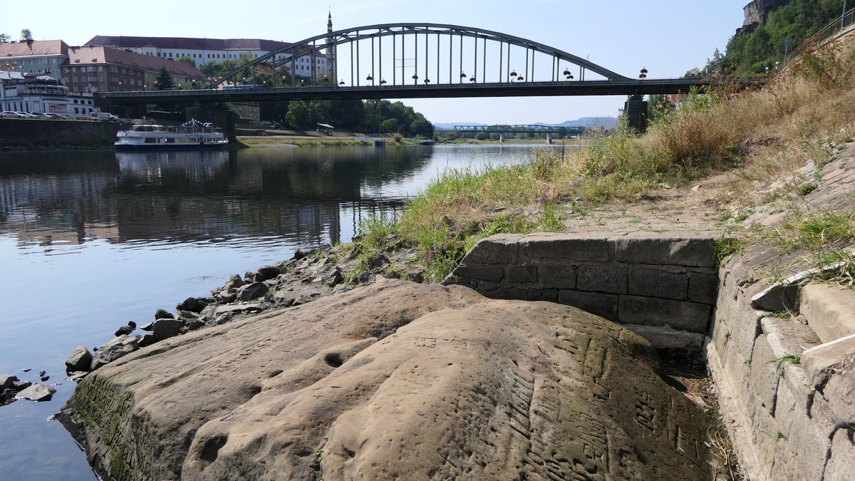 The Danube gave up a German motorcycle with a soldier's remains and a bomb. Drying rivers are revealing war, mammoths, and hunger stones