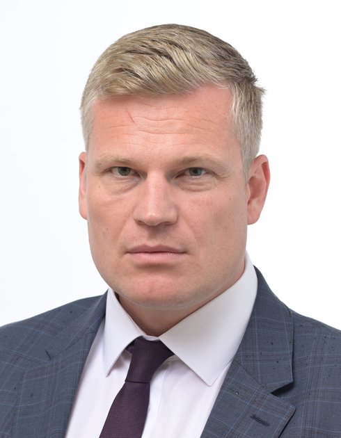Police linked Turek to hate speech posts according to resolution